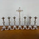 Conjunto de Castiçais Espirais Médios com Cruz banhado a níquel (7 Peças)