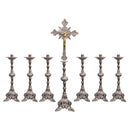 Conjunto de Castiçais Trabalhados com Cruz banhado a níquel (7 Peças)