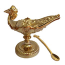 Naveta banhada a ouro